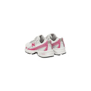 New Balance women white synthetic sneakers featuring white and pink with gray accents in a modern design