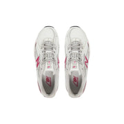 New Balance women white synthetic sneakers with pink accents mesh upper and rubber sole for running use