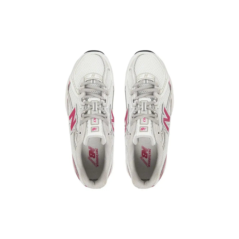 New Balance women white synthetic sneakers with pink accents mesh upper and rubber sole for running use