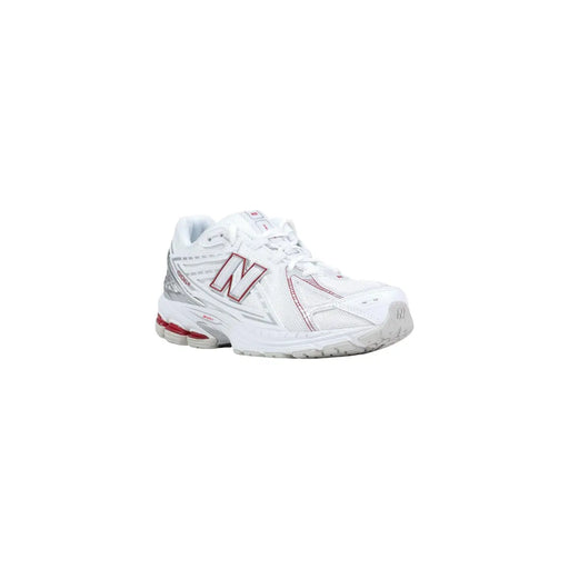 New balance Chaussure de course blanche synthétique pour femme avec des accents roses et argentés visibles de face