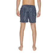 Navy blue nike men’s swim trunks with white wavy pattern made from 100% polyester for swimwear use