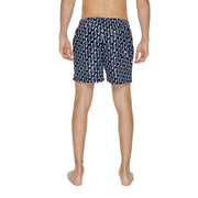 Navy blue nike men’s swim trunks with white wavy pattern made from 100% polyester for swimwear use