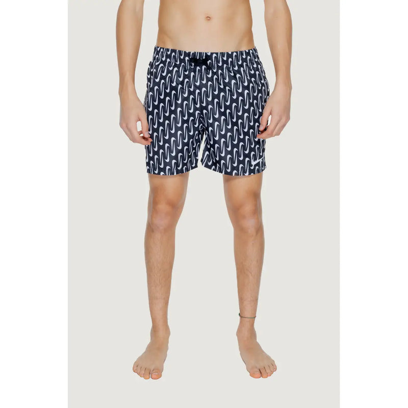 Navy blue Nike men’s swim trunks with white wavy pattern black drawstring waistband made of 100% polyester