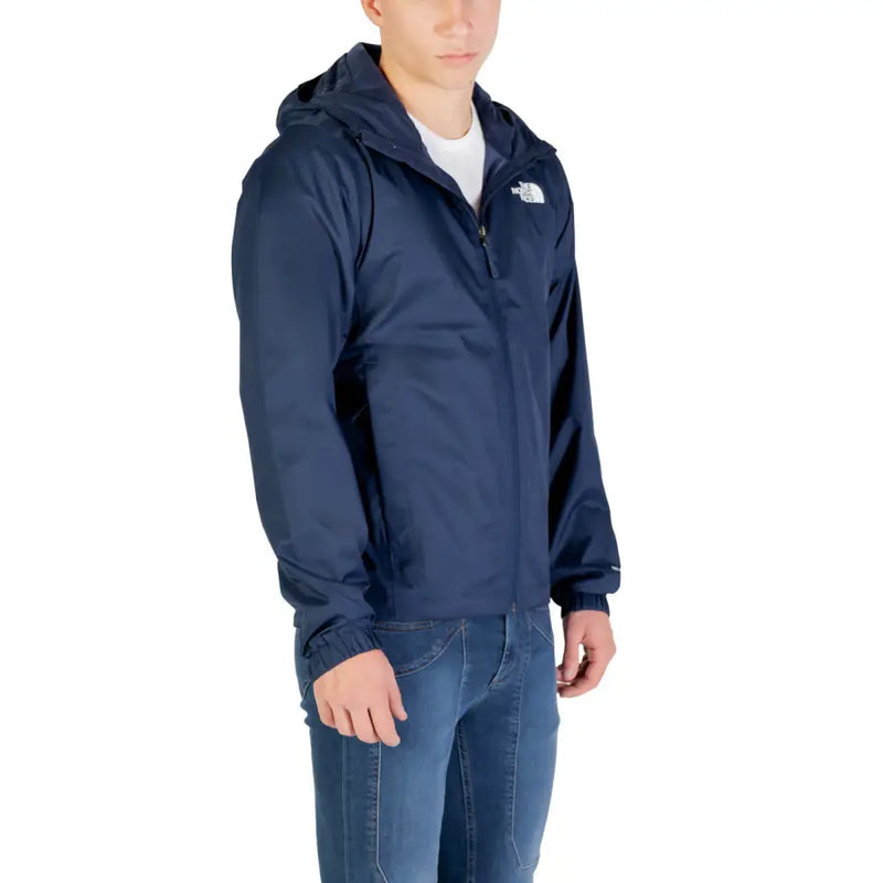 Navy blue hooded windbreaker jacket with the north face logo.
