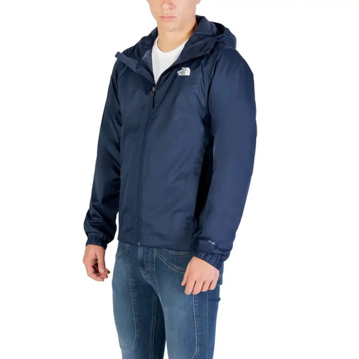 Navy blue hooded jacket with a zipper and the north face logo.