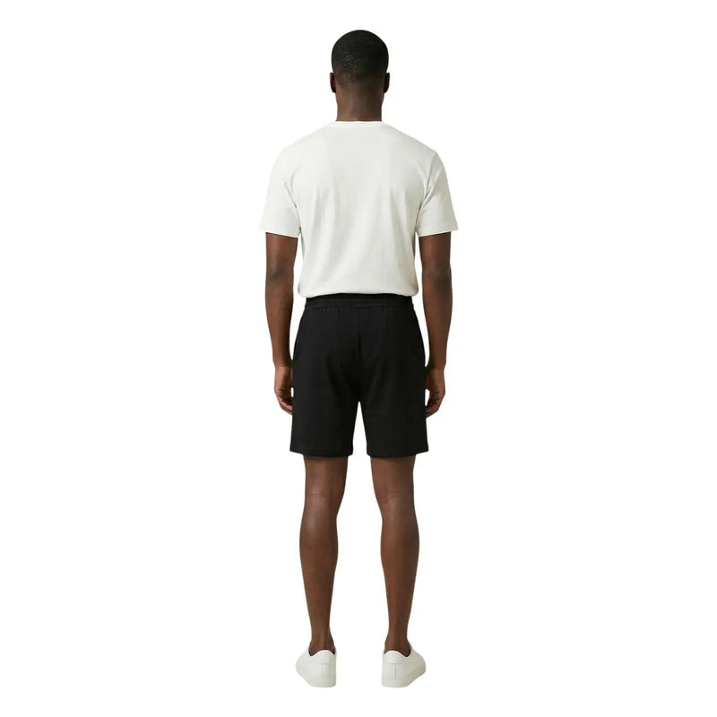Short en coton noir The North Face pour homme, avec plis discrets à la taille, vue de face