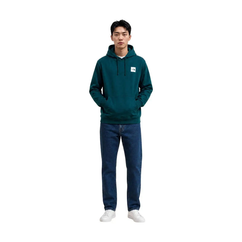 Sweat à capuche The North Face pour homme, en coton vert foncé, avec un logo blanc sur la poitrine.