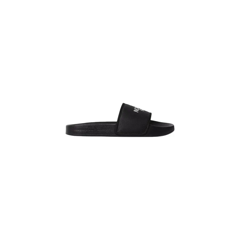 Pantoufles noires The North Face pour homme, avec bride en polyester texturé et logo blanc discret.