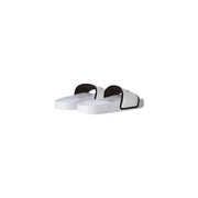 Sandales The North Face pour homme, blanches et noires, en polyester, avec logo blanc imprimé et design minimaliste.