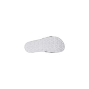 Les pantoufles pour homme The North Face, ornées d'un logo blanc, sont dotées d'une semelle en caoutchouc blanc à motif géométrique et de finitions noires.