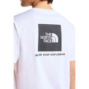 Blanc The North Face hommes t-shirt avec un logo carré noir orné d'un demi-dôme et le texte « N'arrêtez jamais d'explorer ».