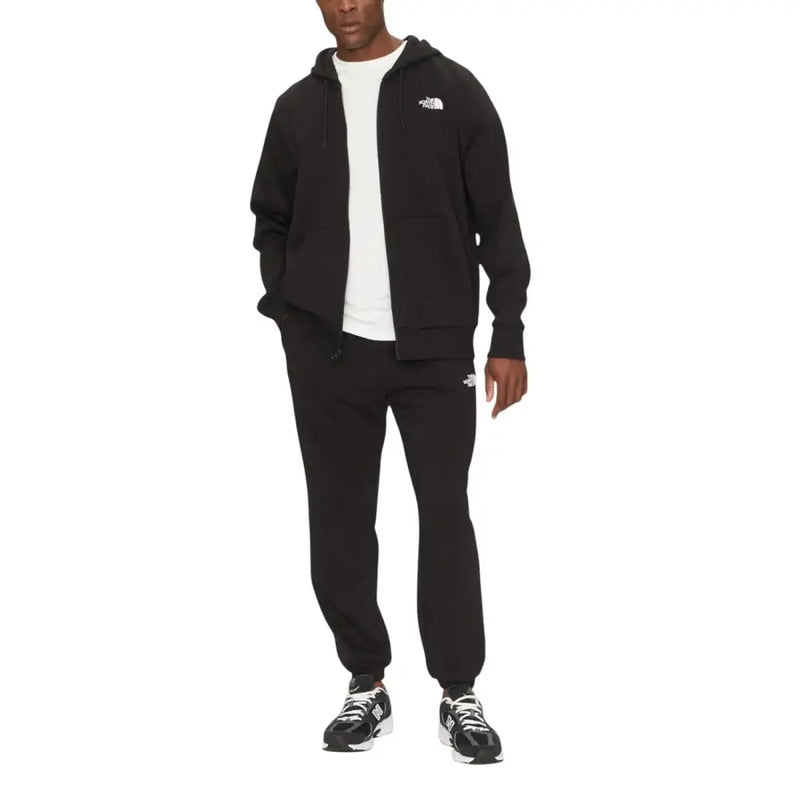 Men’s black zip hooded sweatshirt with white sneakers, suitable for active wear