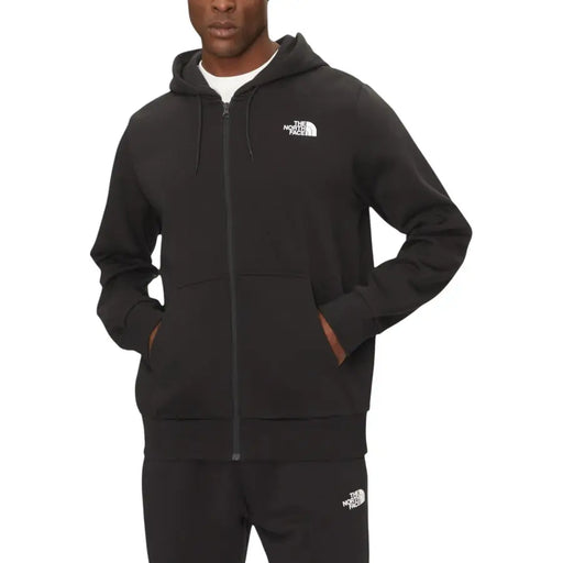Men’s black full-zip hooded tracksuit from The North Face featuring a sweatshirt style