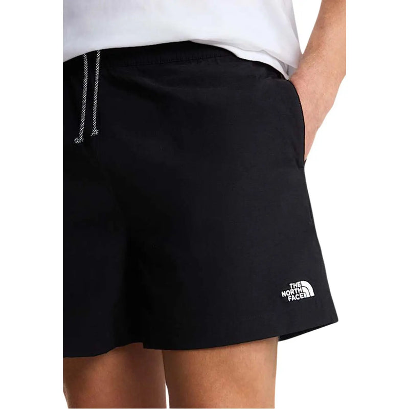 Short The North Face pour homme, noir, avec cordon de serrage et logo blancs, vue de face