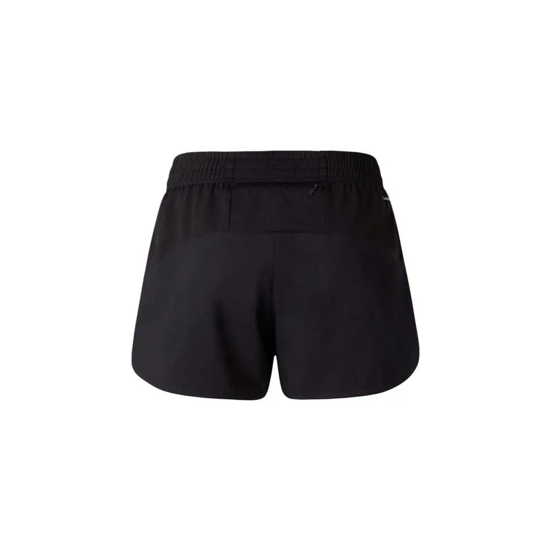 The back side of the north face women black polyester athletic shorts with elastic waistband and zippered pocket