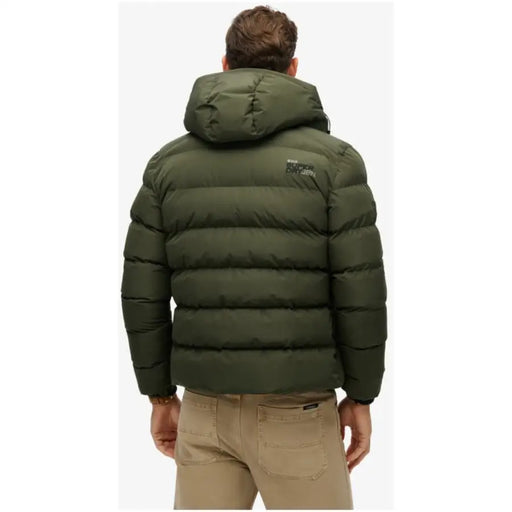 Olive green puffer jacket with hood, stylish and warm outerwear for cold weather