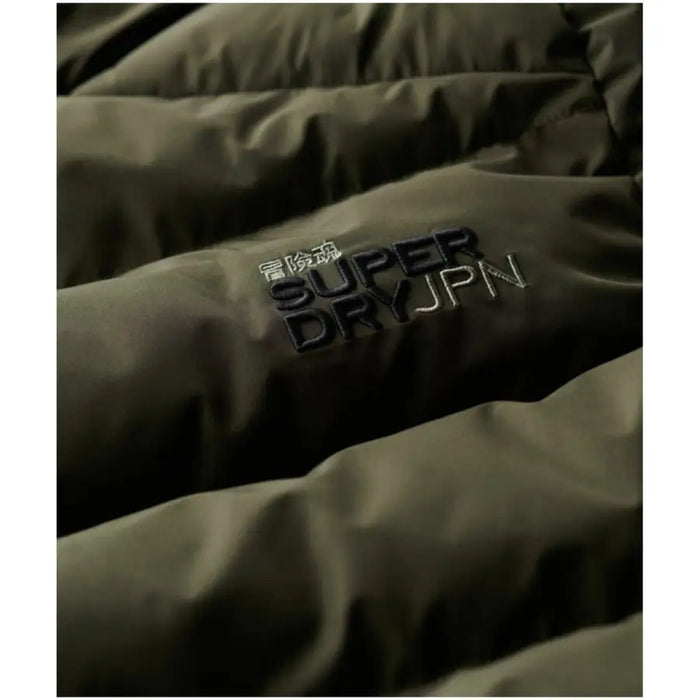 Olive green puffer jacket with hood displayed in the product image