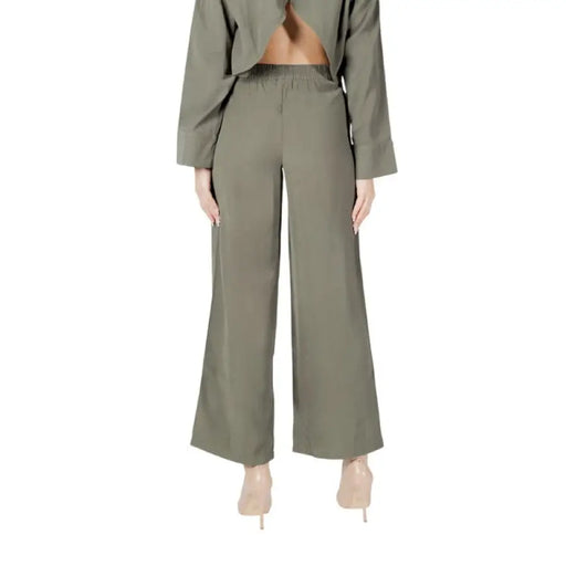 Olive green wide-leg pants displayed as a stylish clothing option for fashion enthusiasts