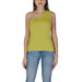 One-shoulder chartreuse sleeveless top with light blue jeans from B.young Women’s collection