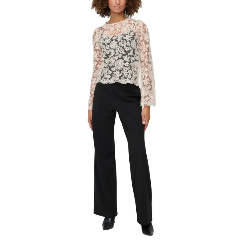 Delicate ivory lace top with floral embroidery, long sleeves, paired with Only black polyester trousers for women