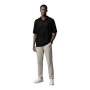 Only Polo homme and sons à col en V, manches courtes, en coton biologique noir avec motif perforé texturé sur la poitrine