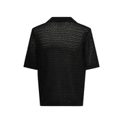 Polo noir à manches courtes en maille à chevrons, fabriqué en coton biologique par Only & Sons Polo homme col V