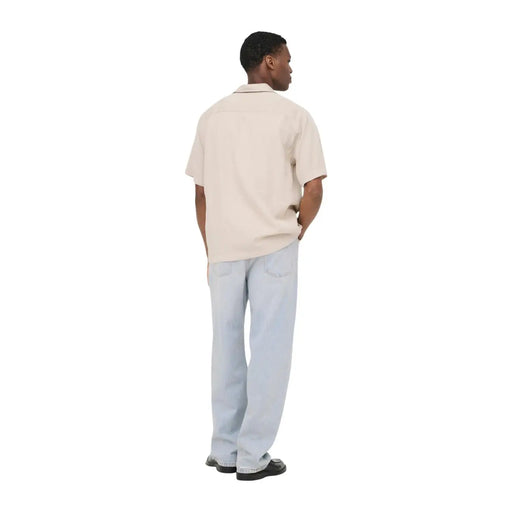 Only Polo beige à manches courtes pour homme, en Tencel, avec col discret et coupe décontractée.