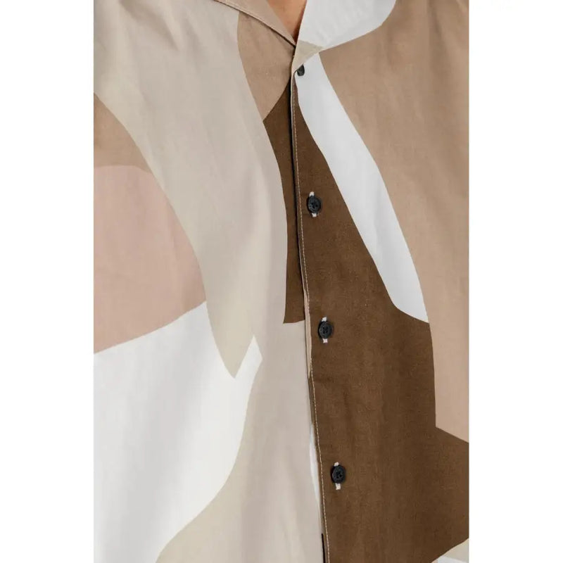 Only & Sons men’s brown print short sleeve shirt featuring a beige tan and white geometric pattern with black buttons