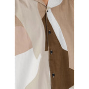 Only & Sons men’s brown print short sleeve shirt featuring a beige tan and white geometric pattern with black buttons