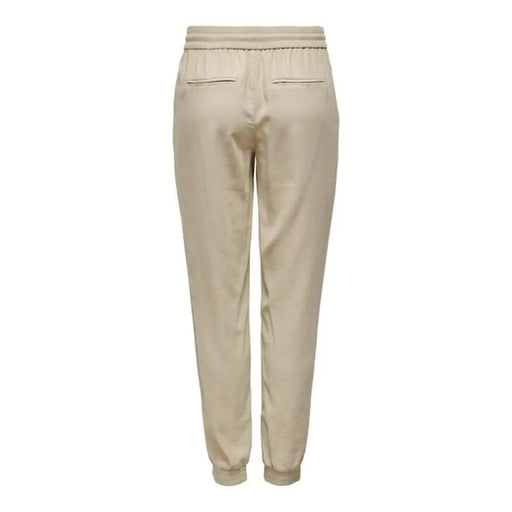 Pantalon beige en viscose à lacets pour femme, coupe décontractée, taille élastiquée et jambes fuselées, idéal pour le printemps et l'été.