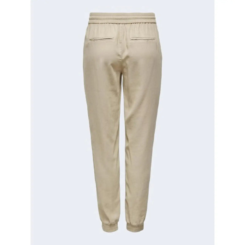 Only Pantalon de jogging beige en viscose pour femme, avec taille élastiquée et chevilles resserrées, idéal pour le printemps et l'été.