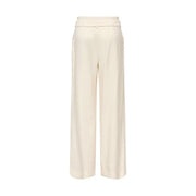 Only Pantalon beige à jambes larges pour femme, en viscose couleur crème, coupe ajustée et plis verticaux discrets, avec ceinture intégrée.