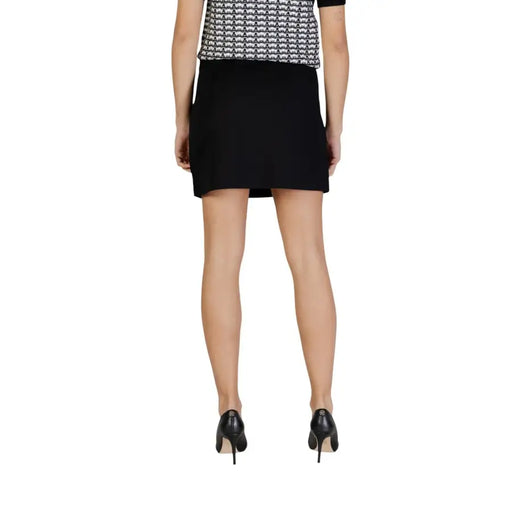 Only women black polyester high-waisted mini skirt with a smooth tailored fit and zip closure