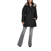 Parka d'hiver noire pour femme, en polyester, avec fermeture éclair sur le devant et capuche doublée de fourrure, style doudoune