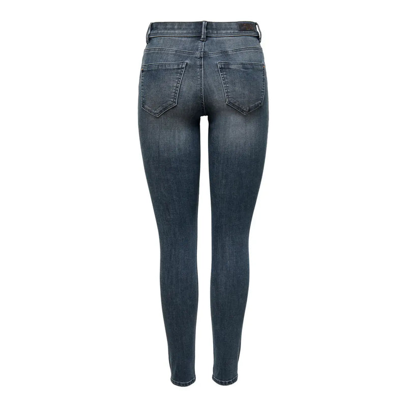 Jean skinny en denim bleu foncé délavé, taille haute et poches arrière classiques, en mélange de coton. Only Femmes