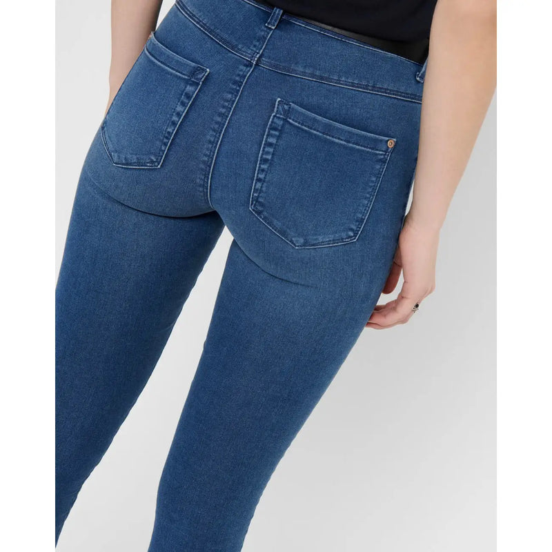 Only Jean skinny taille haute en mélange de coton bleu pour femme, avec poches arrière et délavage subtil visible au dos
