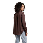 A sleek brown viscose long classic shirt for women with a round neck and buttoned cuffs in satin fabric