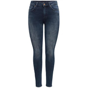 Jean slim en coton bleu foncé avec de subtils détails usés, confectionné en denim stretch, idéal pour l'automne. Only Femmes