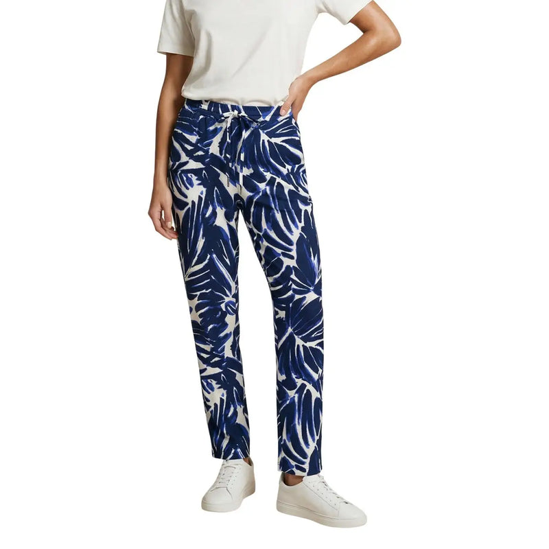 Only Pantalon femme en viscose bleue à fleurs, orné d'un motif de feuilles tropicales bleues et blanches, taille élastiquée avec cordon de serrage et poches avant.