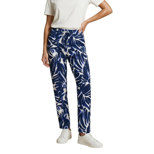Only Pantalon femme en viscose bleue à fleurs, orné d'un motif de feuilles tropicales bleues et blanches, taille élastiquée avec cordon de serrage et poches avant.