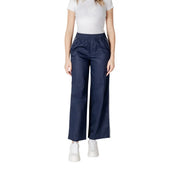 Pantalon large en coton bleu marine pour femme, avec bandes latérales blanches et taille élastiquée, idéal pour le printemps et l'été.