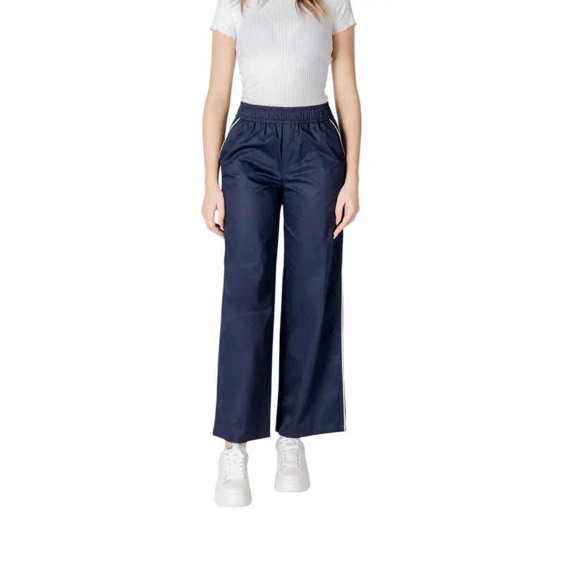 Pantalon large en coton bleu marine pour femme, avec bandes latérales blanches et taille élastiquée, idéal pour le printemps et l'été.