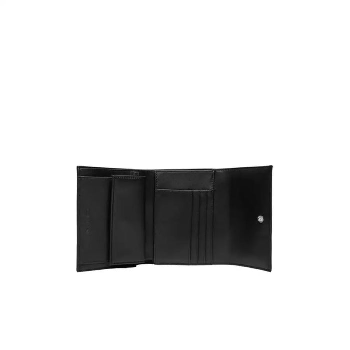 Open black leather wallet from Calvin Klein showcasing its sleek design and quality