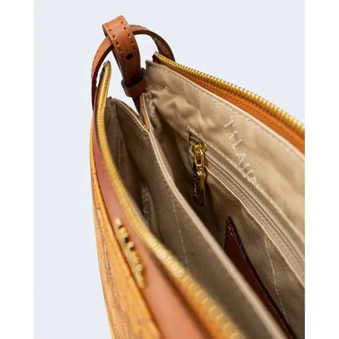 Open brown leather handbag with map pattern for stylish organization