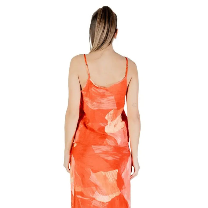 Orange floral print slip dress displayed in the Orange Abstract Print Slip Dress product