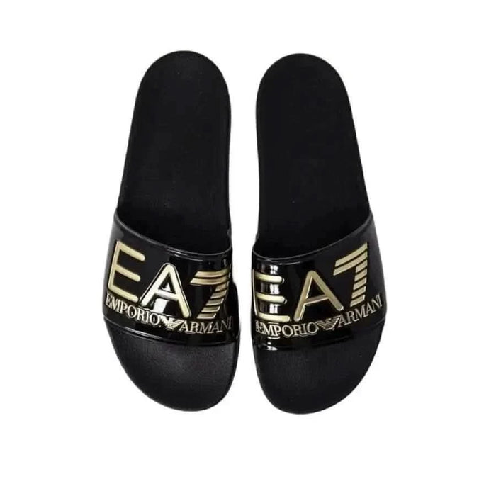 Pair of black slide sandals with gold EA7 Emporio Armani branding for women