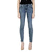 Light blue skinny jeans worn by a model showcasing Guess Women Jeans