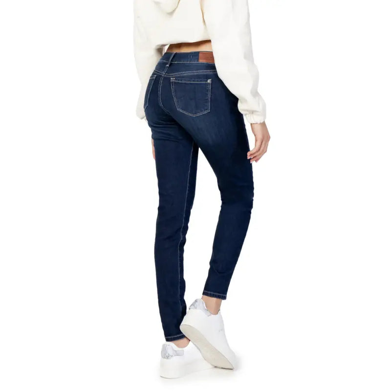 Pepe Jeans women’s blue skinny jeans with brown leather waistband and white stitching featuring front pockets