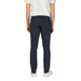 Person showcasing Jeckerson Mens Blue Cotton Trousers in dark blue pants