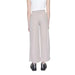 Person in grey linen Jacqueline De Yong women trousers for urban city style